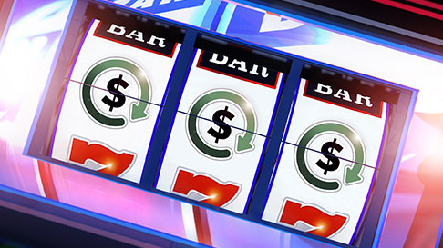 Real Time Rewards logos on a slot machine reel.