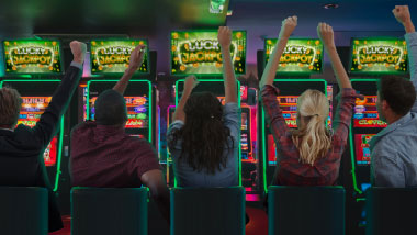 Excited people playing in a slot tournament