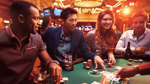 group playing blackjack