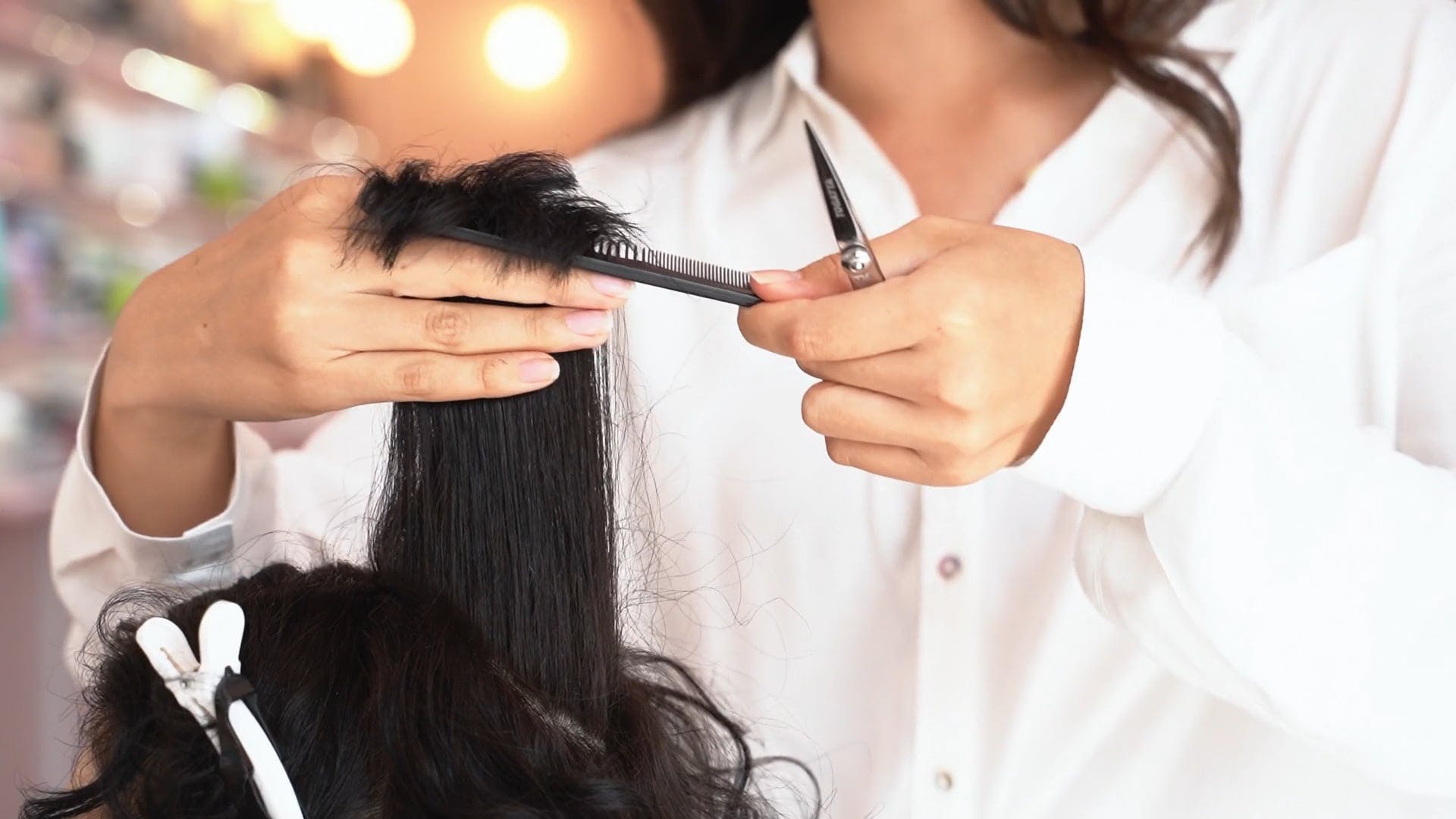 stylist cutting hair