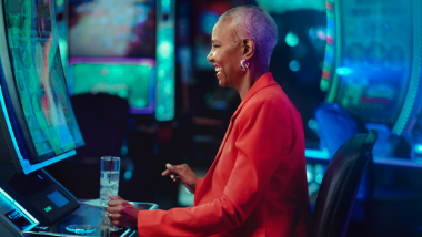 Person playing at a slot machine